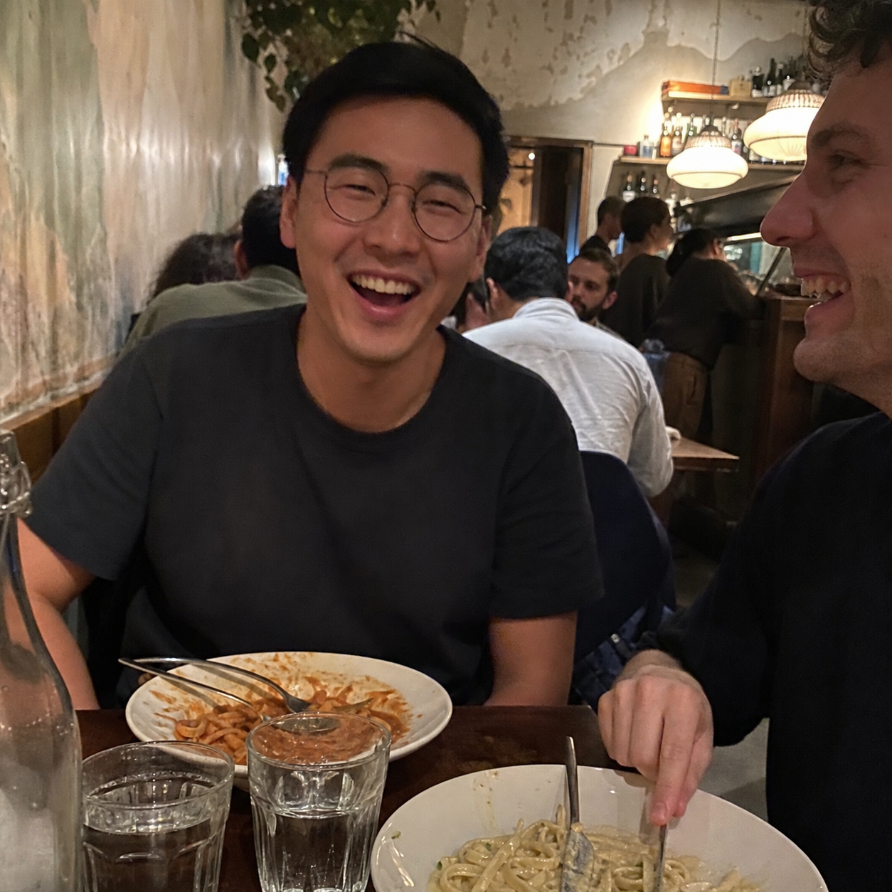 Friends sharing dinner in Melbourne
